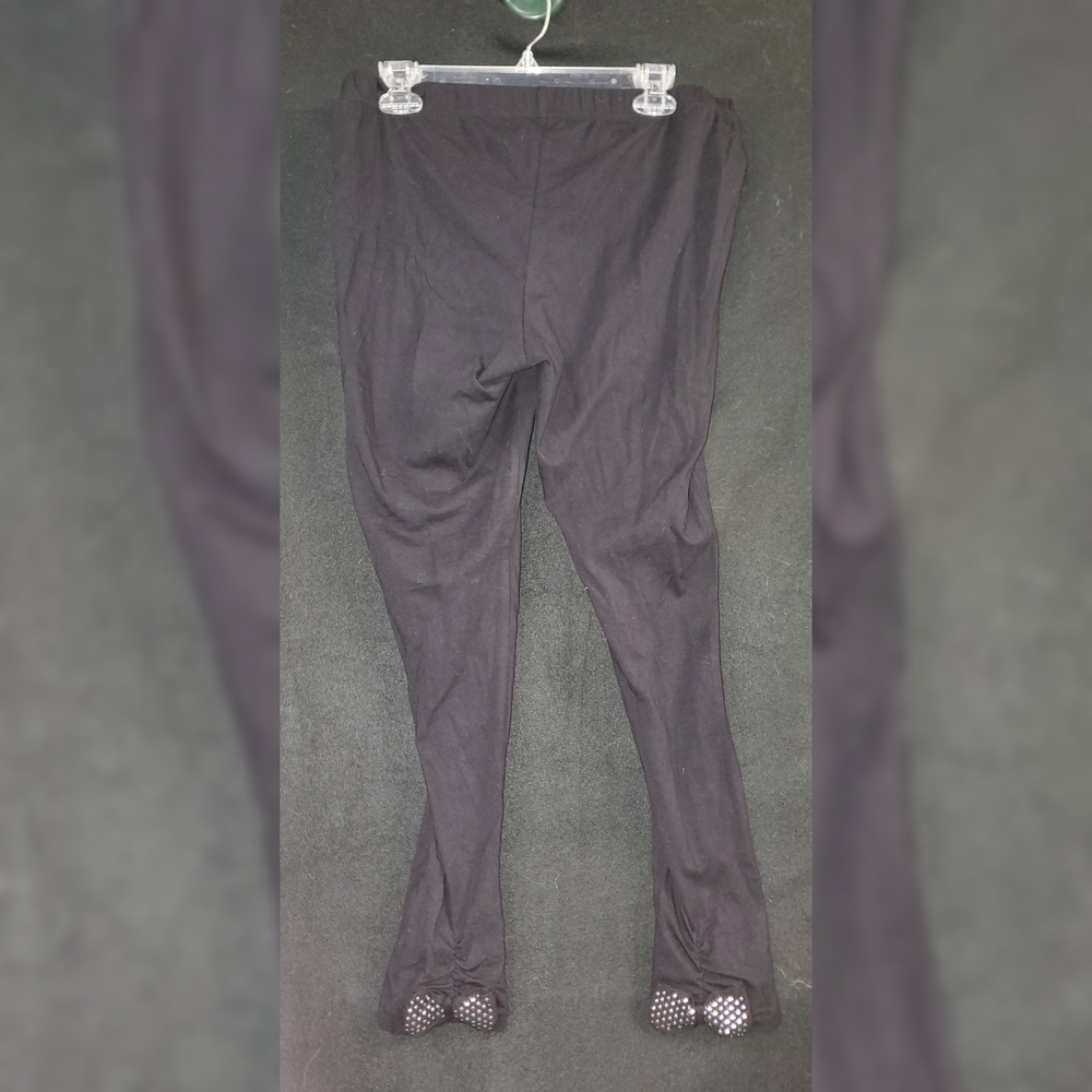 Torrid Black Bow Bottom Leggings. 2